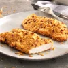 Kipschnitzels met gebakken uitjes