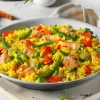 Paella met kip en groenten